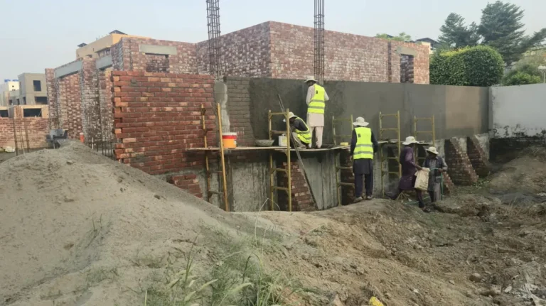 Basement retaining wall plaster at a 1 Kanal house in DHA Phase 7 Lahore
