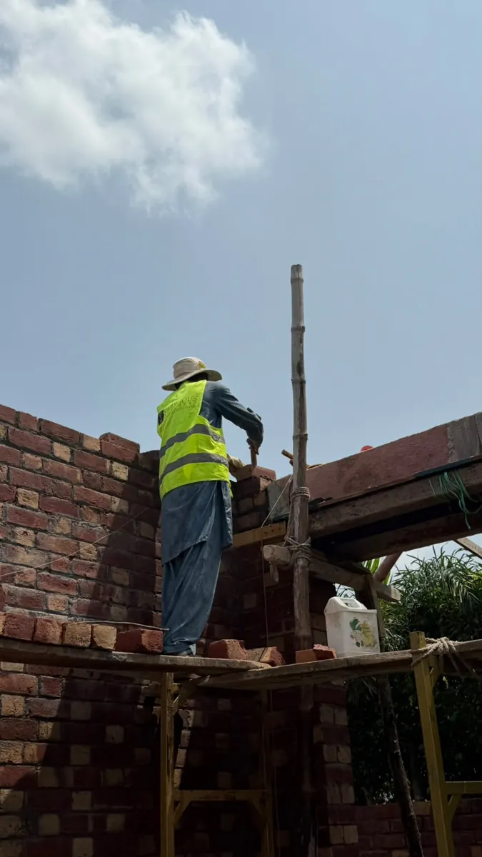 10 Marla grey structure in Lake City M2 Block Lahore: brick masonry at lintel level