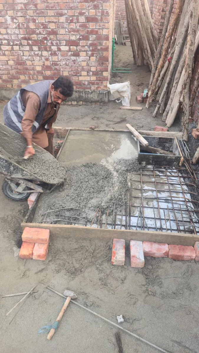 Glorious Builders team casting concrete at a 10 Marla house in Lake City Lahore