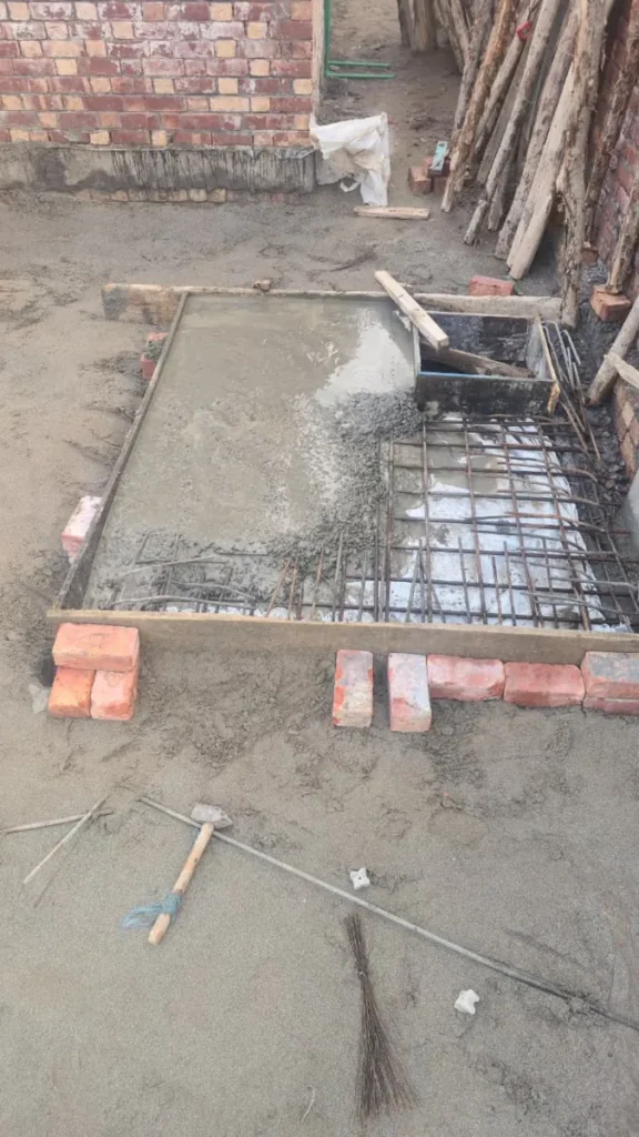 10 Marla house construction in Lake City Lahore: floor concrete over steel mesh