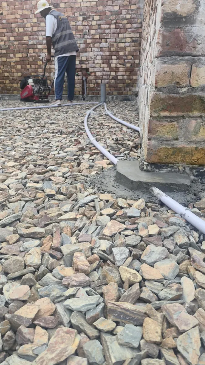 Stone soling with conduit pipes at a 10 Marla house in Lake City Lahore